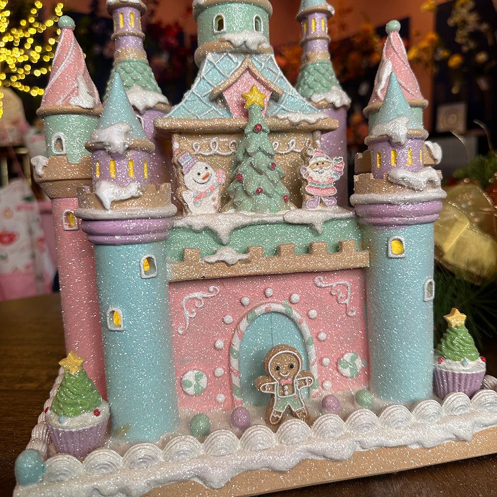 Viv! Christmas Weihnachtsfigur - Lebkuchen Schloss voller Süßigkeiten inkl. LED Beleuchtung - Pastell - rosa blau - 42cm