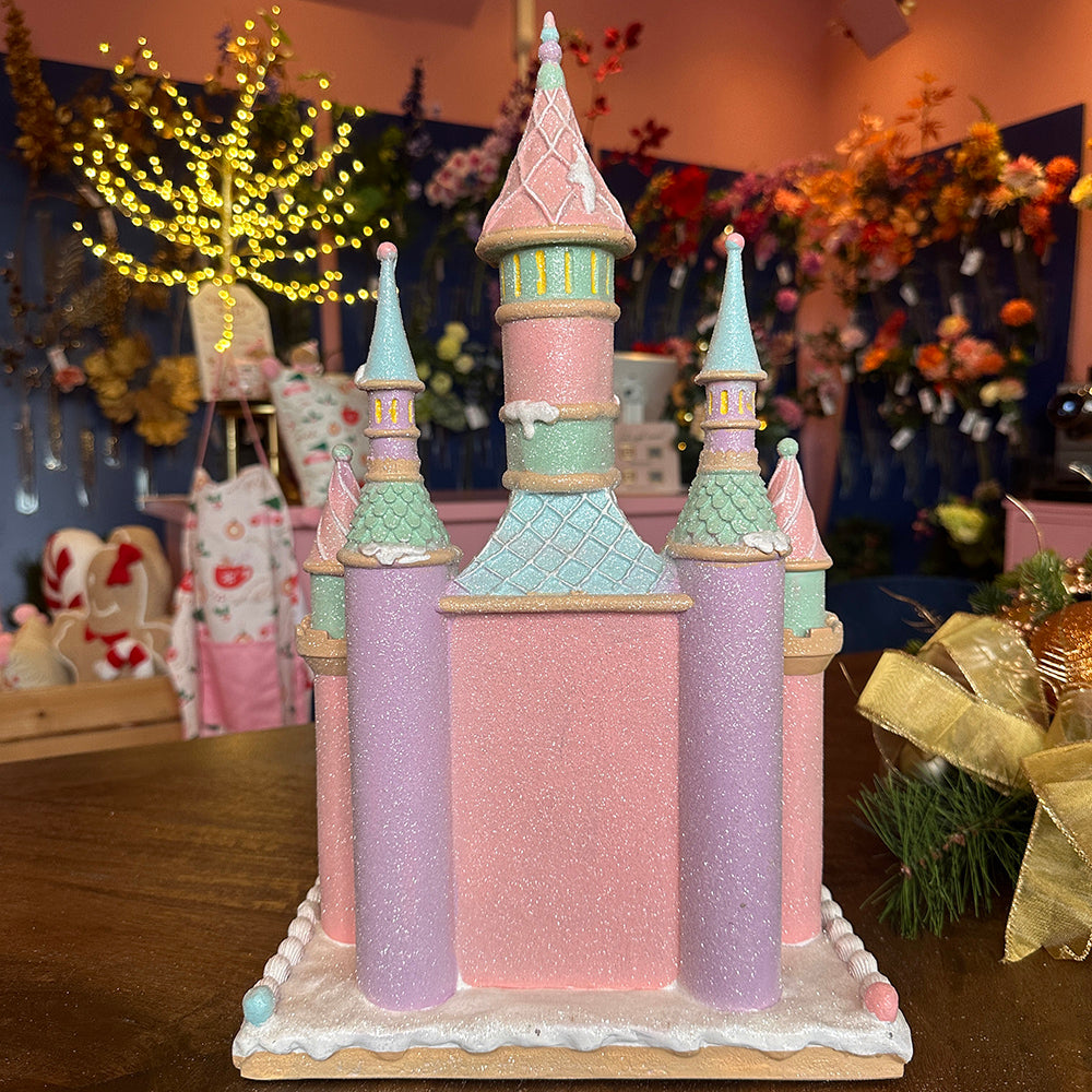 Viv! Christmas Weihnachtsfigur - Lebkuchen Schloss voller Süßigkeiten inkl. LED Beleuchtung - Pastell - rosa blau - 42cm