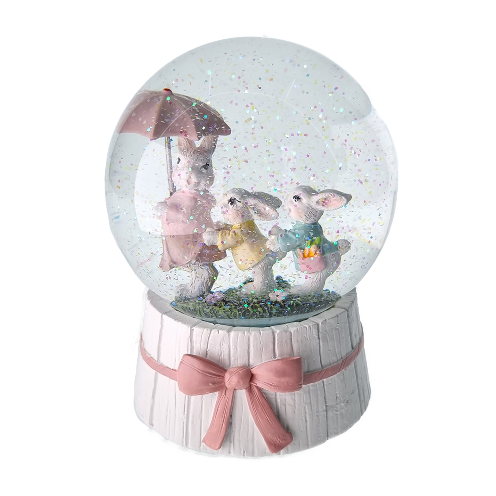 Viv! Christmas Paasdecoratie - Sneeuwbol incl. Muziekdoos - Drie paashaasjes met paraplu - pasen - pastel - 16 cm